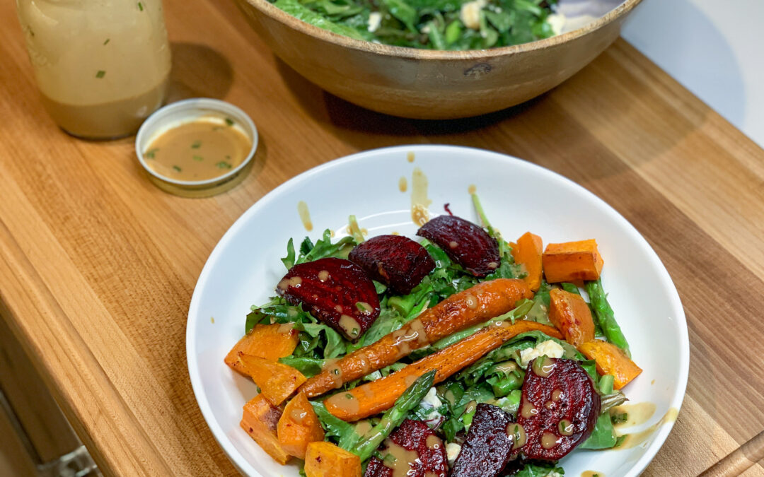 Plant-Based Power Bowl: roasted beet, sweet potato, & carrots, blanched asparagus, and mixed greens with a tahini chive vinaigrette